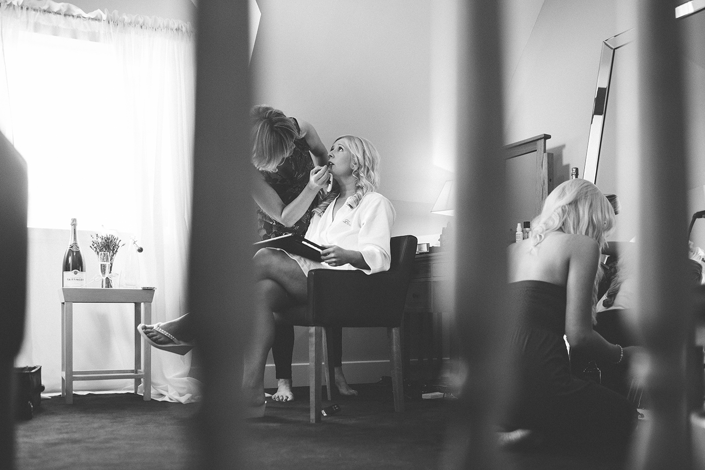 A bride gets ready in the Bridal Boudoir at this barn wedding venue in Cambridgeshire