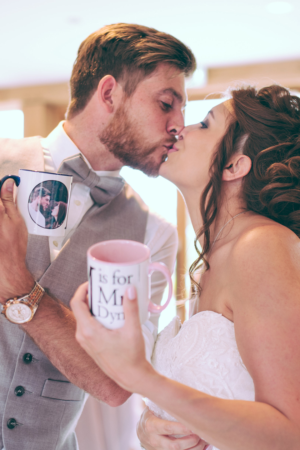 The couple were gifted personalised mugs on their wedding day at Bassmead Manor Barns