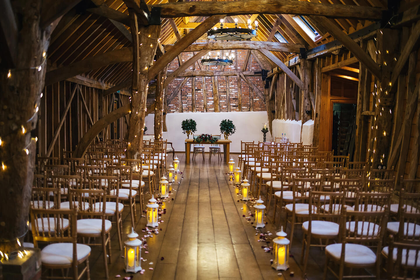 The Rickety Barn at Bassmead Manor Barns is dressed for a beautiful winter wedding
