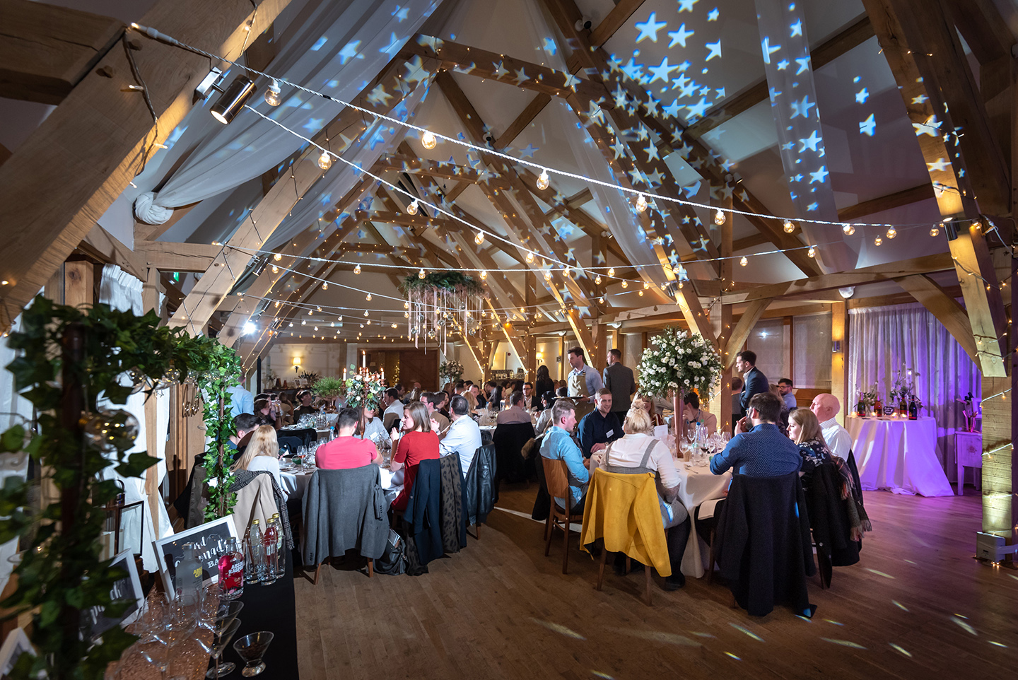 Wedding couples share their excitement and wedding ideas in the Bridge Barn during their tasting event at Bassmead Manor Barns