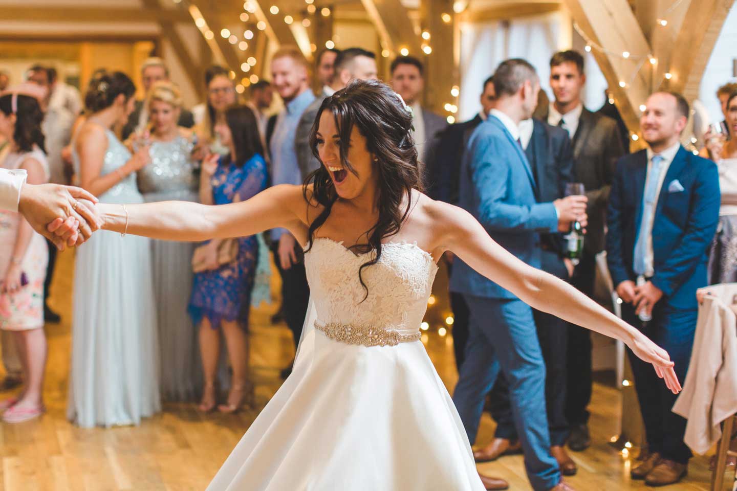 Bride takes to the dancefloor with her groom.