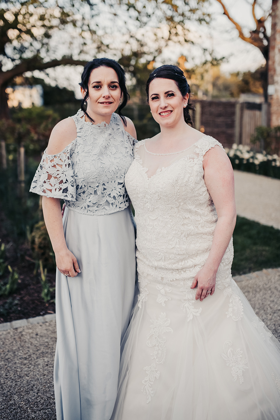 Rachel’s bridesmaid wore a full length silver gown from Coast