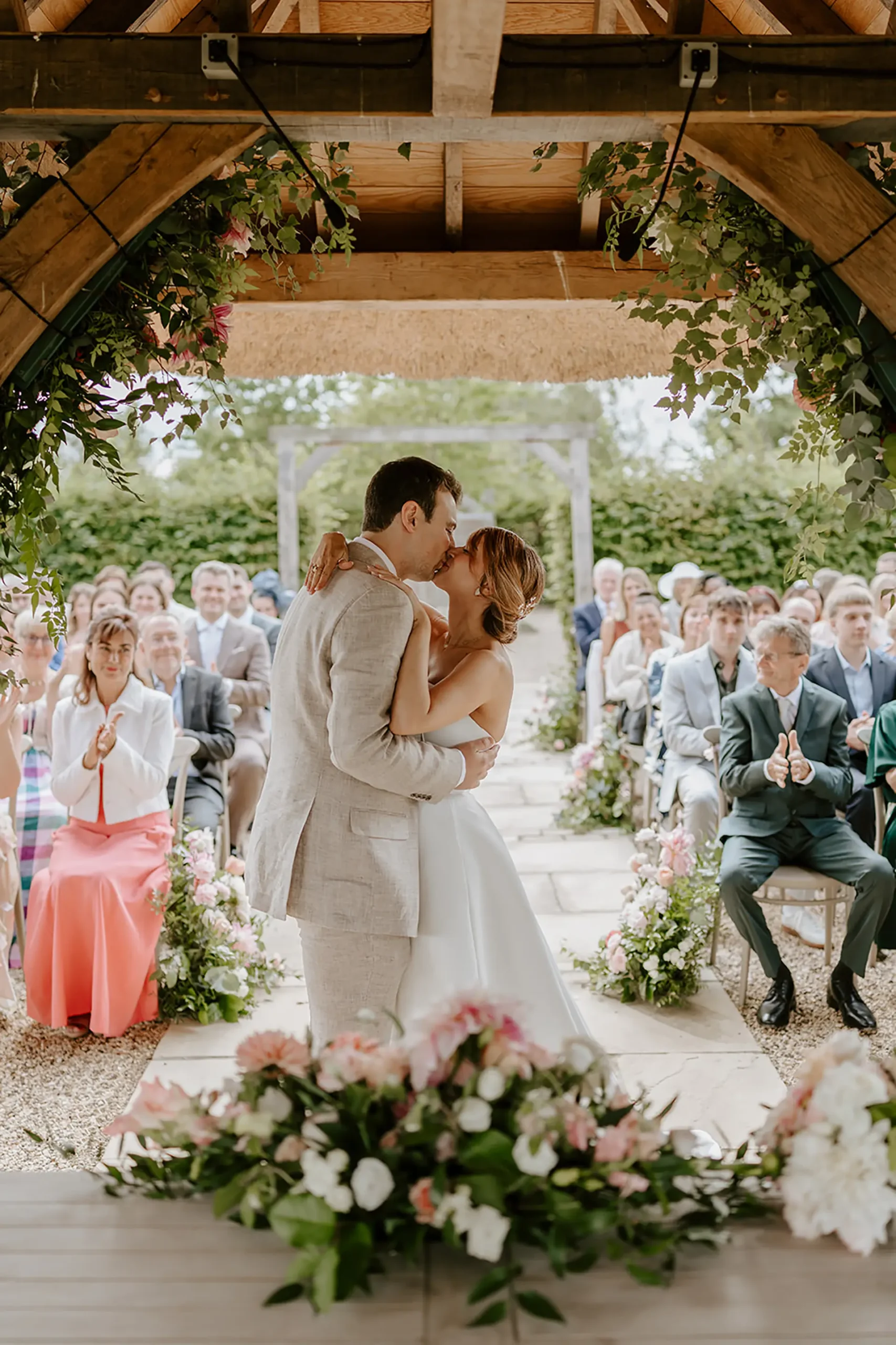 bassmead manor barns outdoor ceremony kiss