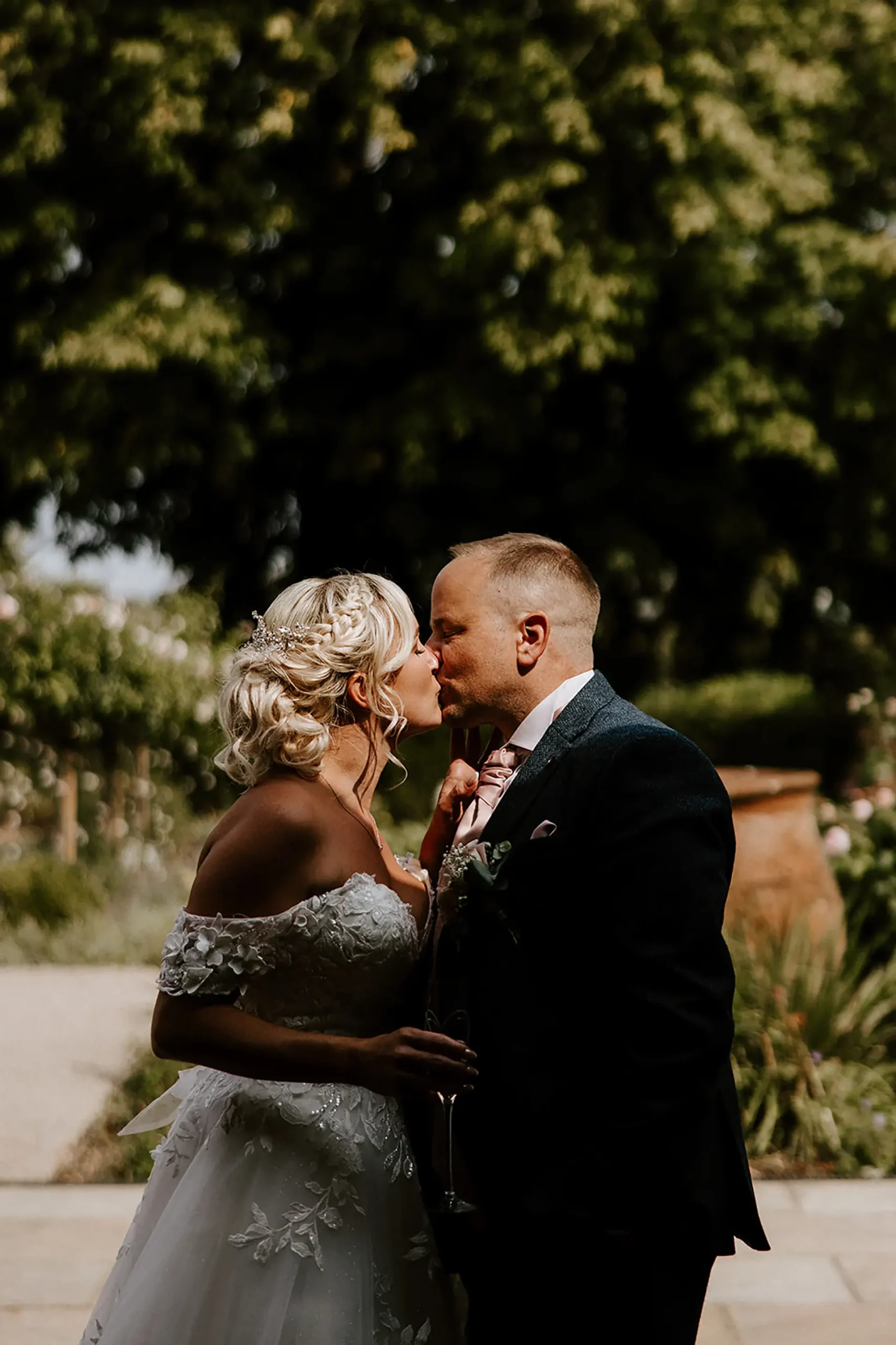 bassmead manor barns garden couple kissing
